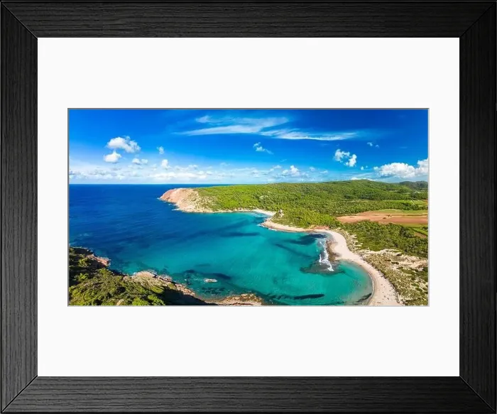 Framed Print : Aerial drone view of Menorca seascape at cala de Algariens, Spain Framed Print : Aerial drone view of Menorca seascape at cala de Algariens, Spain