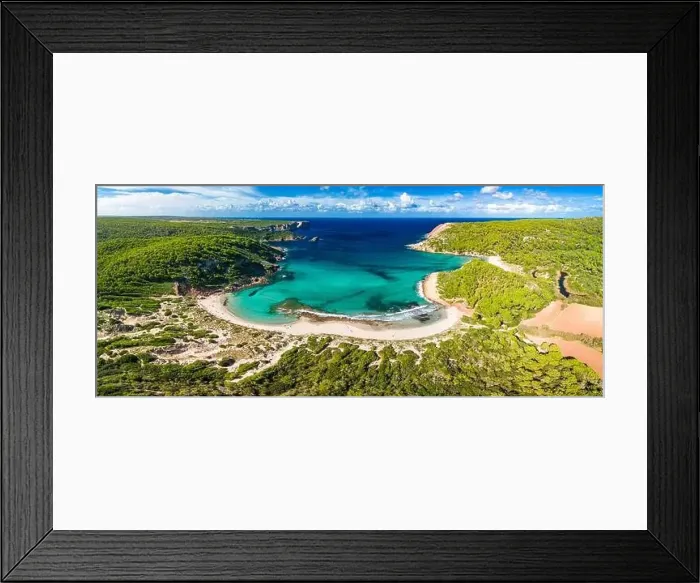 Framed Print : Aerial drone view of Menorca seascape at cala de Algariens, Spain Framed Print : Aerial drone view of Menorca seascape at cala de Algariens, Spain