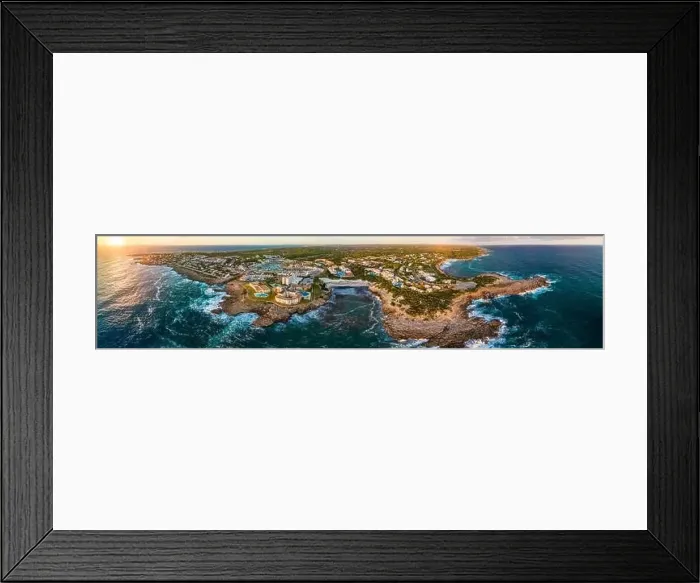 Framed Print : Aerial drone view of the harbor, housing and the beach of Cala en Bosc on the Spanish island of Menorca Framed Print : Aerial drone view of the harbor, housing and the beach of Cala en Bosc on the Spanish island of Menorca