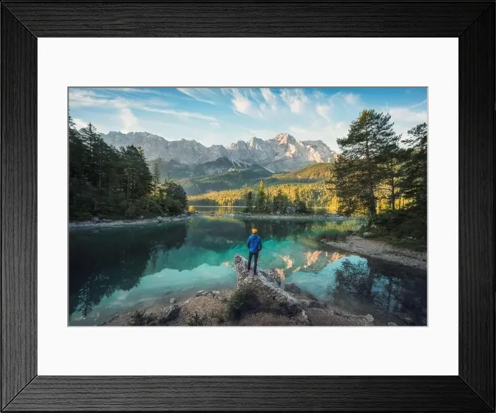 Framed Print : Man enjoying the amazing morning scenery at a gorgeous lake in the Bavarian Alps