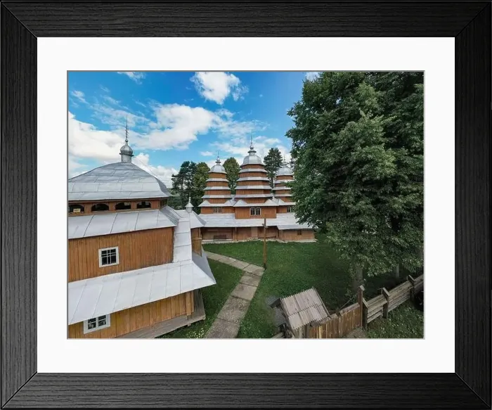Framed Print : Matkiv, Ukraine - July 21, 2021: Aerial view on ancient wooden Church of Synaxis of the Holy Mother of God in Matkiv