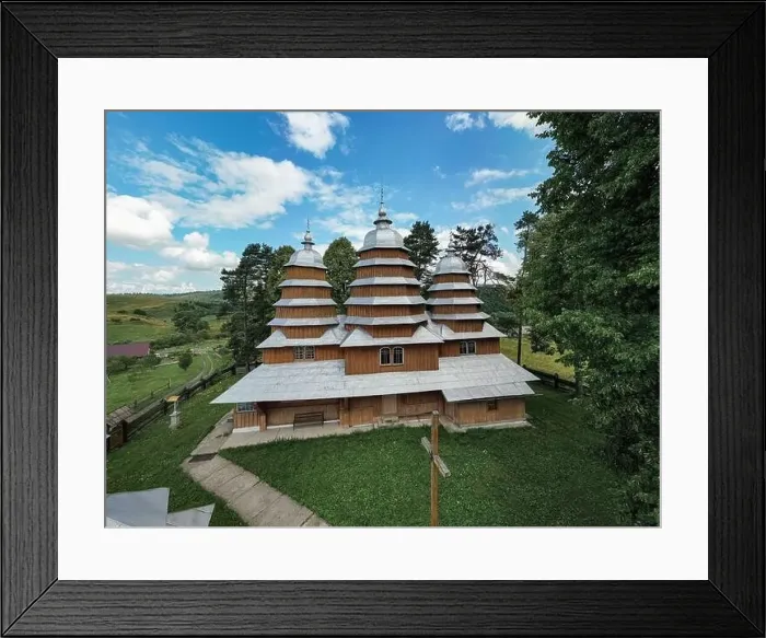 Framed Print : Matkiv, Ukraine - July 21, 2021: Aerial view on ancient wooden Church of Synaxis of the Holy Mother of God in Matkiv Framed Print : Matkiv, Ukraine - July 21, 2021: Aerial view on ancient wooden Church of Synaxis of the Holy Mother of God in Matkiv