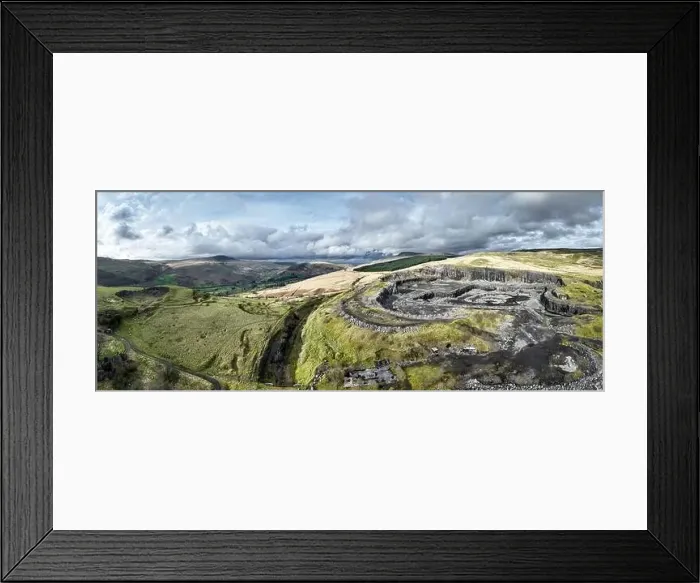 Framed Print : Panoramic view of a large open cast limestone quarry at Penwyllt in the Upper Swansea Valley in South Wales UK