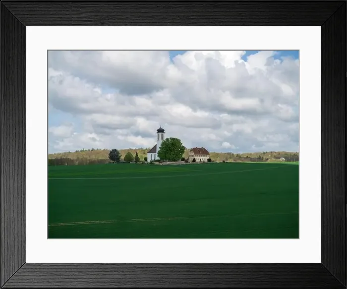 Framed Print : Small church with cemetery in the middle of blooming fruit trees and fields captured with a drone in spring Framed Print : Small church with cemetery in the middle of blooming fruit trees and fields captured with a drone in spring