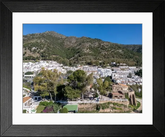 Framed Print : aerial view of the beautiful Mediterranean village of Mijas on the Costa del Sol of Malaga, Spain Framed Print : aerial view of the beautiful Mediterranean village of Mijas on the Costa del Sol of Malaga, Spain