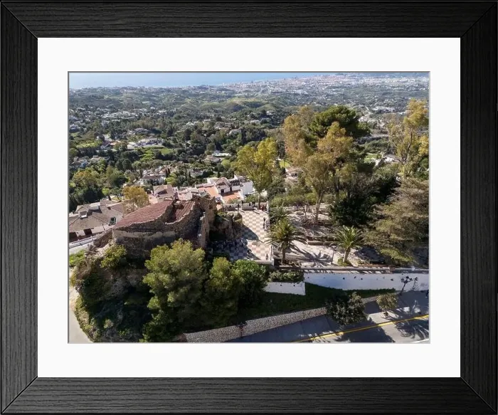 Framed Print : aerial view of the beautiful Mediterranean village of Mijas on the Costa del Sol of Malaga, Spain Framed Print : aerial view of the beautiful Mediterranean village of Mijas on the Costa del Sol of Malaga, Spain