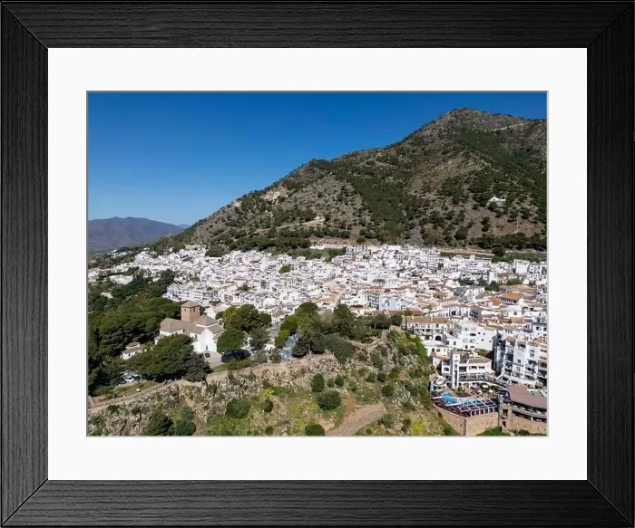 Framed Print : aerial view of the beautiful Mediterranean village of Mijas on the Costa del Sol of Malaga, Spain Framed Print : aerial view of the beautiful Mediterranean village of Mijas on the Costa del Sol of Malaga, Spain