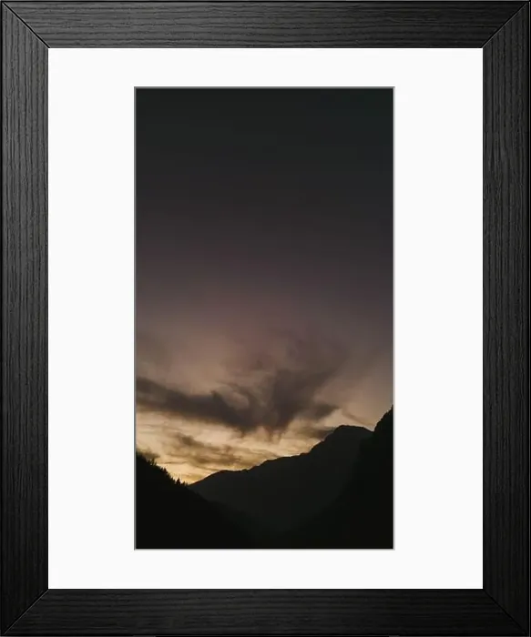 Framed Print : Nature's masterpiece: Sun-kissed clouds dance across a sky ablaze with colour Framed Print : Nature's masterpiece: Sun-kissed clouds dance across a sky ablaze with colour
