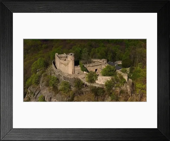 Framed Print : An aerial view captures the medieval Chojnik Castle atop a mountain in the Karkonosze range