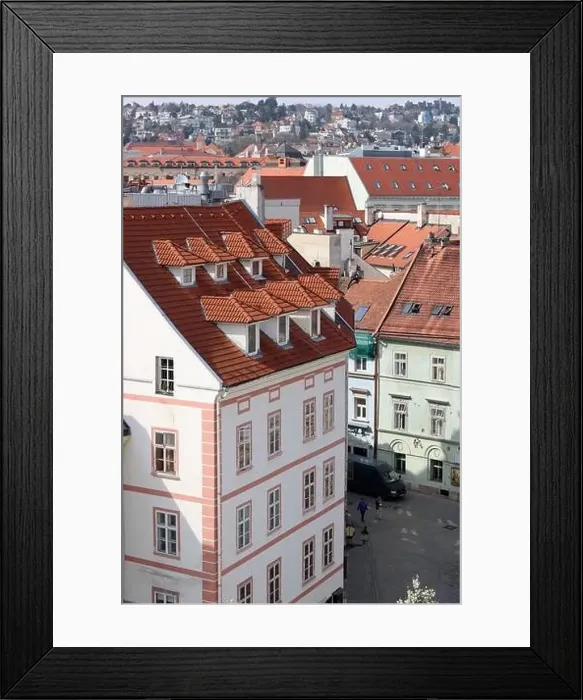Framed Print : View of the Old Town from the Castle Hill, Bratislava, Slovakia. Street view, old red roofed houses. Spring in Europe Framed Print : View of the Old Town from the Castle Hill, Bratislava, Slovakia. Street view, old red roofed houses. Spring in Europe