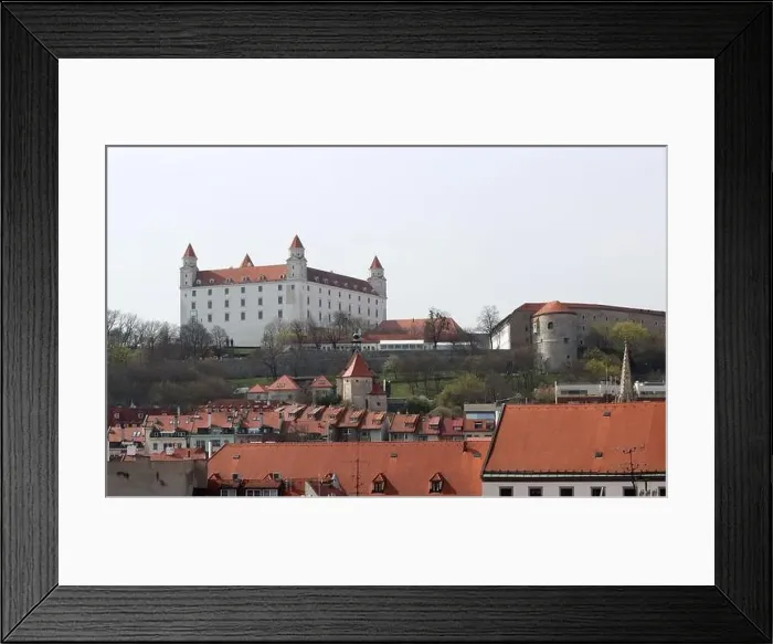 Framed Print : View of the Old Town from the Castle Hill, Bratislava, Slovakia. Street view, old red roofed houses. Spring in Europe Framed Print : View of the Old Town from the Castle Hill, Bratislava, Slovakia. Street view, old red roofed houses. Spring in Europe