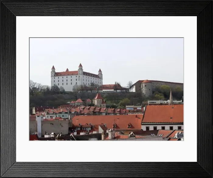 Framed Print : View of the Old Town from the Castle Hill, Bratislava, Slovakia. Street view, old red roofed houses. Spring in Europe Framed Print : View of the Old Town from the Castle Hill, Bratislava, Slovakia. Street view, old red roofed houses. Spring in Europe