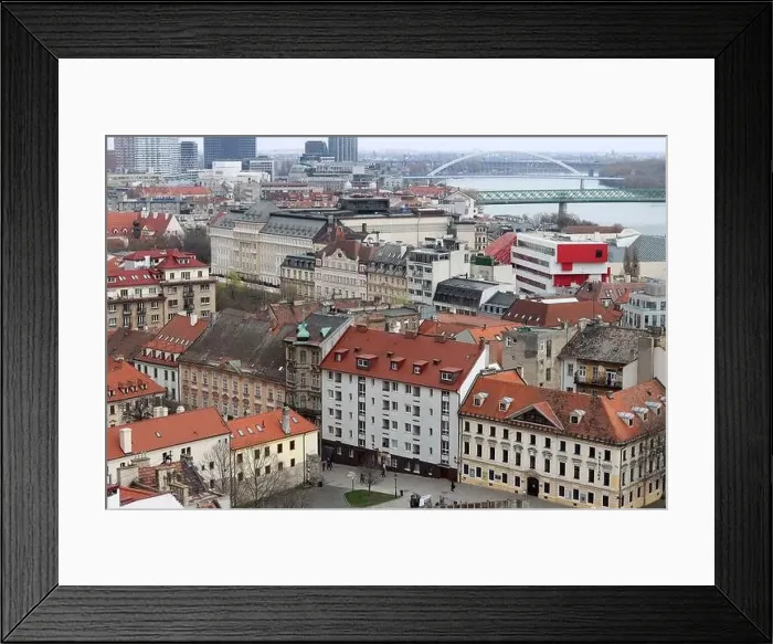 Framed Print : View of the Old Town from the Castle Hill, Bratislava, Slovakia. Street view, old red roofed houses. Spring in Europe Framed Print : View of the Old Town from the Castle Hill, Bratislava, Slovakia. Street view, old red roofed houses. Spring in Europe