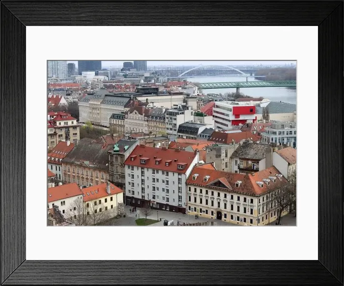 Framed Print : View of the Old Town from the Castle Hill, Bratislava, Slovakia. Street view, old red roofed houses. Spring in Europe Framed Print : View of the Old Town from the Castle Hill, Bratislava, Slovakia. Street view, old red roofed houses. Spring in Europe