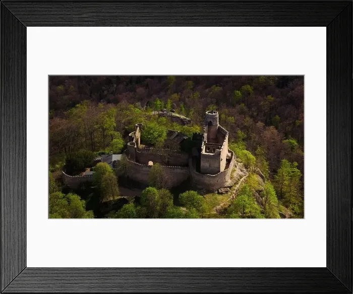 Framed Print : An aerial view captures the medieval Chojnik Castle atop a mountain in the Karkonosze range Framed Print : An aerial view captures the medieval Chojnik Castle atop a mountain in the Karkonosze range