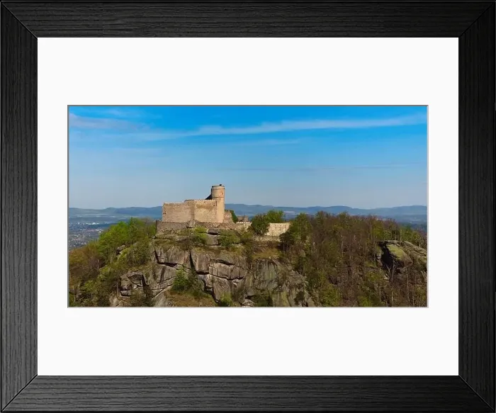 Framed Print : An aerial view captures the medieval Chojnik Castle atop a mountain in the Karkonosze range Framed Print : An aerial view captures the medieval Chojnik Castle atop a mountain in the Karkonosze range