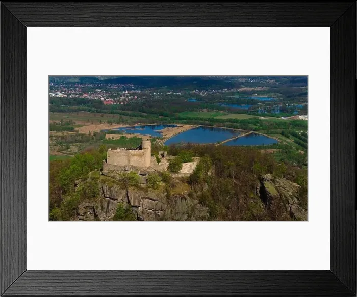 Framed Print : An aerial view captures the medieval Chojnik Castle atop a mountain in the Karkonosze range Framed Print : An aerial view captures the medieval Chojnik Castle atop a mountain in the Karkonosze range