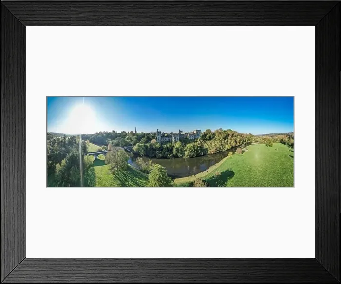 Framed Print : An aerial panorama reveals the majestic Lismore Castle in County Waterford, Ireland, set against a flawless spring sky Framed Print : An aerial panorama reveals the majestic Lismore Castle in County Waterford, Ireland, set against a flawless spring sky