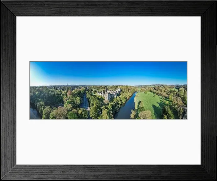 Framed Print : An aerial panorama reveals the majestic Lismore Castle in County Waterford, Ireland, set against a flawless spring sky Framed Print : An aerial panorama reveals the majestic Lismore Castle in County Waterford, Ireland, set against a flawless spring sky