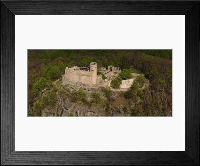 Framed Print : An aerial view captures the medieval Chojnik Castle atop a mountain in the Karkonosze range Framed Print : An aerial view captures the medieval Chojnik Castle atop a mountain in the Karkonosze range