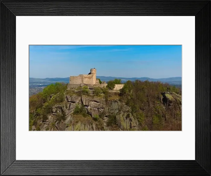 Framed Print : An aerial view captures the medieval Chojnik Castle atop a mountain in the Karkonosze range Framed Print : An aerial view captures the medieval Chojnik Castle atop a mountain in the Karkonosze range