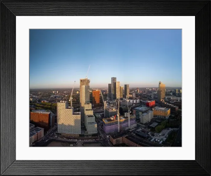 Framed Print : An aerial view capturing a modern city's high-rise buildings Framed Print : An aerial view capturing a modern city's high-rise buildings