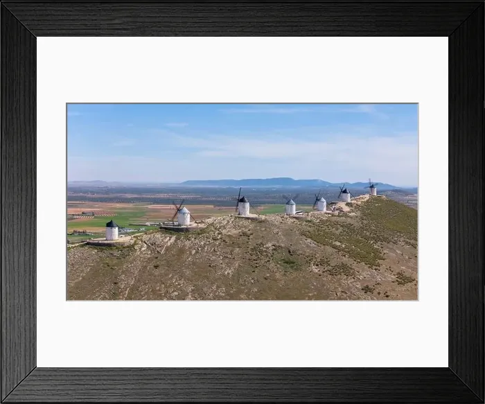 Framed Print : Aerial drone photo of the old windmills and castle in Consuegra, Spain Framed Print : Aerial drone photo of the old windmills and castle in Consuegra, Spain