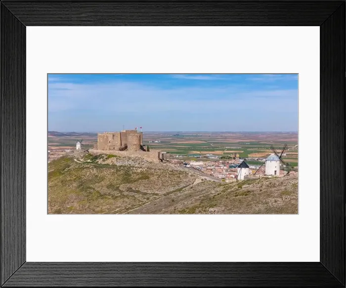 Framed Print : Aerial drone photo of the old windmills and castle in Consuegra, Spain Framed Print : Aerial drone photo of the old windmills and castle in Consuegra, Spain