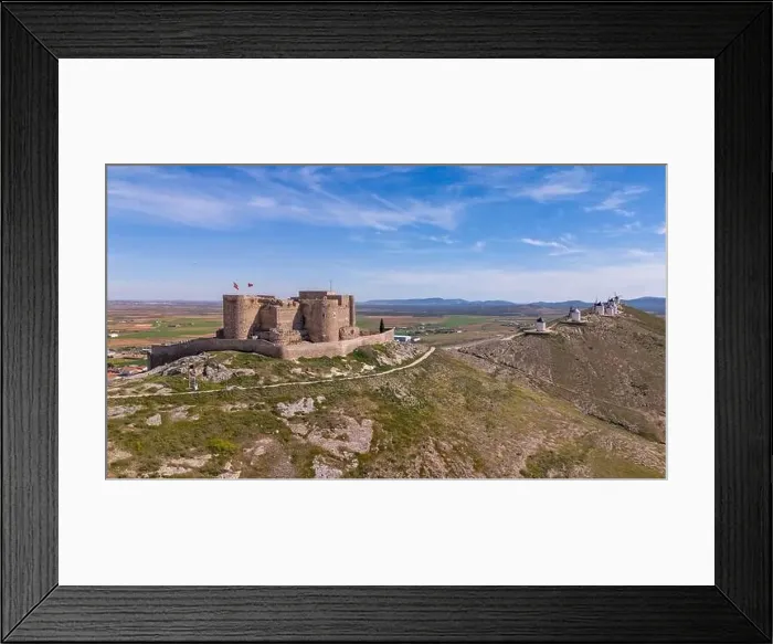Framed Print : Aerial drone photo of the old windmills and castle in Consuegra, Spain Framed Print : Aerial drone photo of the old windmills and castle in Consuegra, Spain