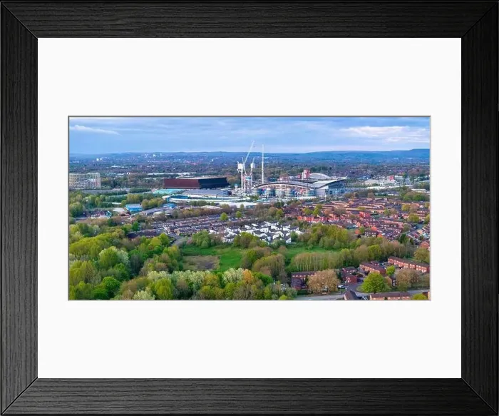 Framed Print : Aerial image of Bradford residential in Manchester showing Edithad Stadium on the distance Framed Print : Aerial image of Bradford residential in Manchester showing Edithad Stadium on the distance