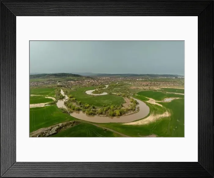 Framed Print : Landscape photo about curving Sajo river and Sajoszentpeter town on the background in North Hungary Framed Print : Landscape photo about curving Sajo river and Sajoszentpeter town on the background in North Hungary
