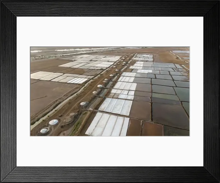 Framed Print : Aerial view of salt farm near sea at Valsad District, Gujarat India. Drone view of salt farming Framed Print : Aerial view of salt farm near sea at Valsad District, Gujarat India. Drone view of salt farming