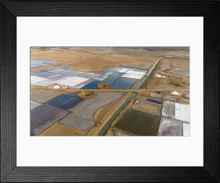Framed Print : Aerial view of salt farm near sea at Valsad District, Gujarat India. Drone view of salt farming Framed Print : Aerial view of salt farm near sea at Valsad District, Gujarat India. Drone view of salt farming