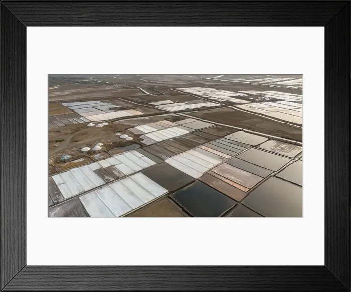 Framed Print : Aerial view of salt farm near sea at Valsad District, Gujarat India. Drone view of salt farming Framed Print : Aerial view of salt farm near sea at Valsad District, Gujarat India. Drone view of salt farming