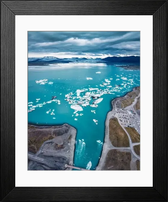Framed Print : Panorama aerial view of Jokulsarlon glacier lagoon with iceberg floating on gloomy day in Vatnajokull national park Framed Print : Panorama aerial view of Jokulsarlon glacier lagoon with iceberg floating on gloomy day in Vatnajokull national park