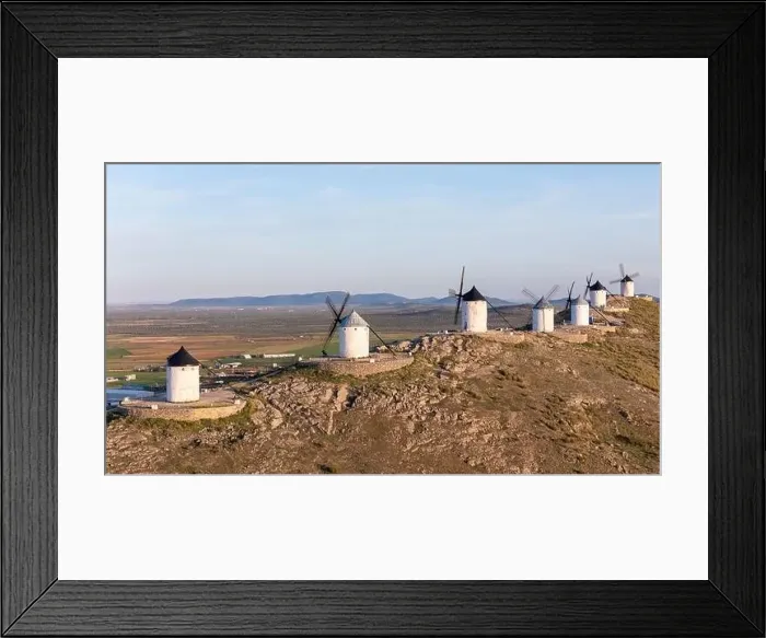 Framed Print : Aerial drone photo of the old windmills and castle in Consuegra, Spain Framed Print : Aerial drone photo of the old windmills and castle in Consuegra, Spain