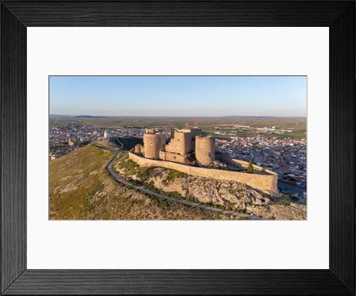 Framed Print : Aerial drone photo of the old windmills and castle in Consuegra, Spain Framed Print : Aerial drone photo of the old windmills and castle in Consuegra, Spain