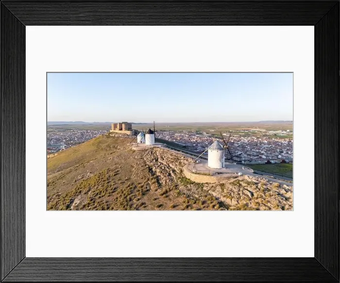 Framed Print : Aerial drone photo of the old windmills and castle in Consuegra, Spain Framed Print : Aerial drone photo of the old windmills and castle in Consuegra, Spain