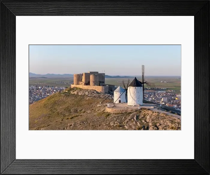 Framed Print : Aerial drone photo of the old windmills and castle in Consuegra, Spain Framed Print : Aerial drone photo of the old windmills and castle in Consuegra, Spain