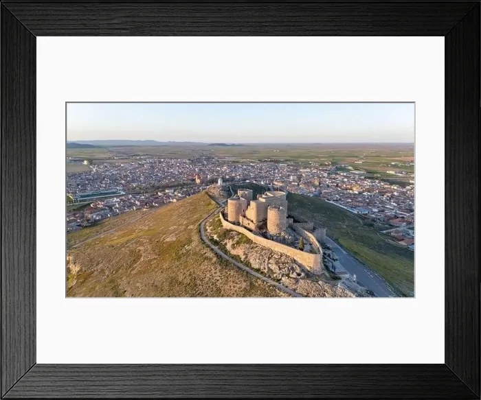 Framed Print : Aerial drone photo of the old windmills and castle in Consuegra, Spain Framed Print : Aerial drone photo of the old windmills and castle in Consuegra, Spain