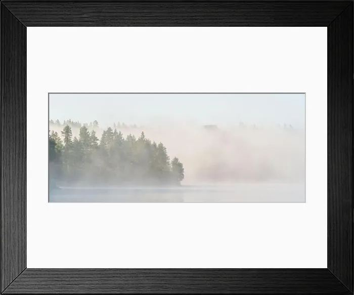 Framed Print : A misty forest envelops a serene body of water Framed Print : A misty forest envelops a serene body of water