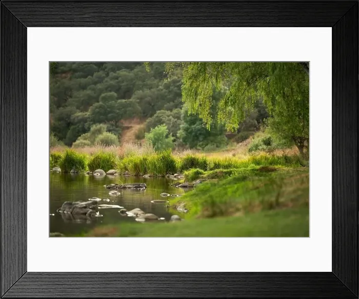 Framed Print : Beautiful natural scenery of river in southeast Asia tropical green forest with mountains in background Framed Print : Beautiful natural scenery of river in southeast Asia tropical green forest with mountains in background
