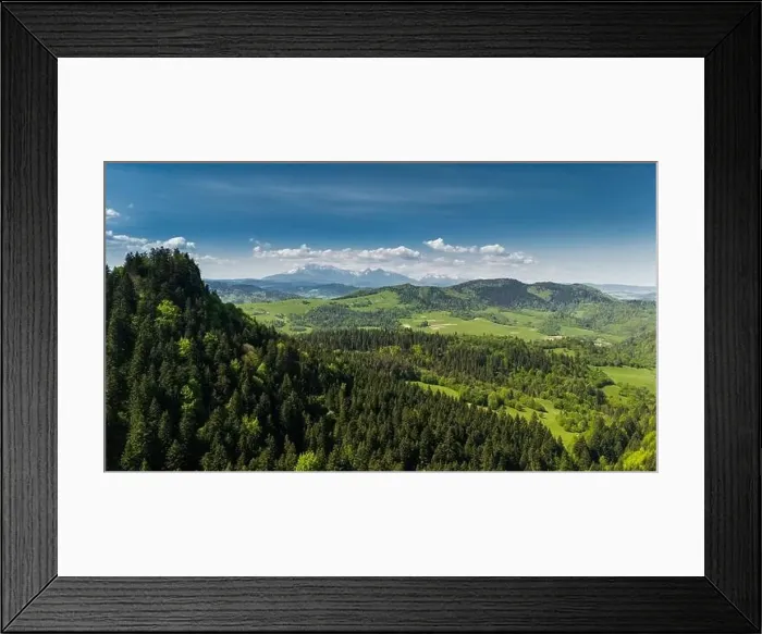 Framed Print : Aerial drone view over green hills of Pieniny National Park and snowy Tatra Mountains Framed Print : Aerial drone view over green hills of Pieniny National Park and snowy Tatra Mountains