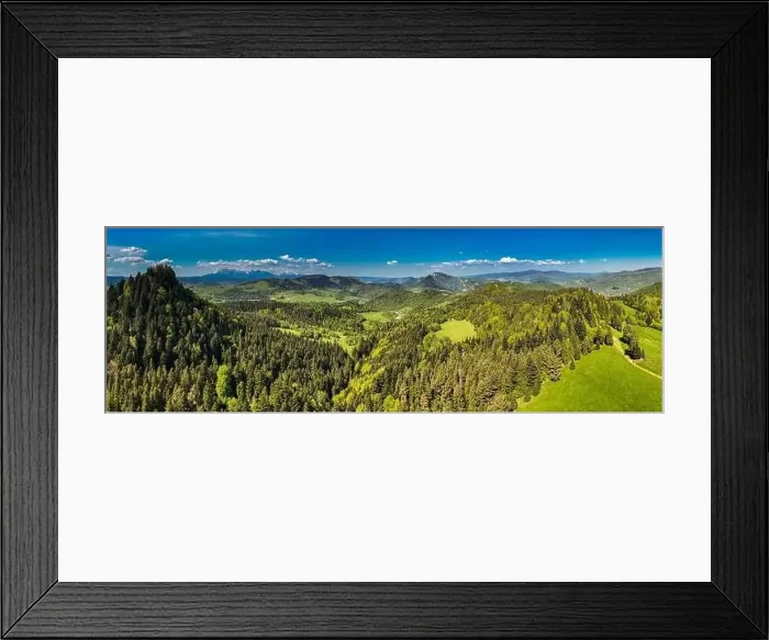 Framed Print : Aerial drone view over green hills of Pieniny National Park and snowy Tatra Mountains Framed Print : Aerial drone view over green hills of Pieniny National Park and snowy Tatra Mountains