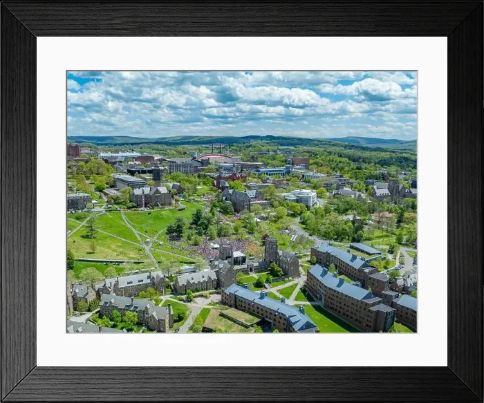 Framed Print : Ithaca, NY, USA - 05-08-2024: Distant aerial images of Slope Day at Cornell University Libe Slope, Ithaca, NY, USA Framed Print : Ithaca, NY, USA - 05-08-2024: Distant aerial images of Slope Day at Cornell University Libe Slope, Ithaca, NY, USA