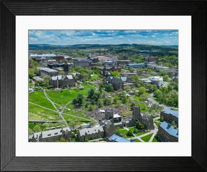 Framed Print : Ithaca, NY, USA - 05-08-2024: Distant aerial images of Slope Day at Cornell University Libe Slope, Ithaca, NY, USA Framed Print : Ithaca, NY, USA - 05-08-2024: Distant aerial images of Slope Day at Cornell University Libe Slope, Ithaca, NY, USA
