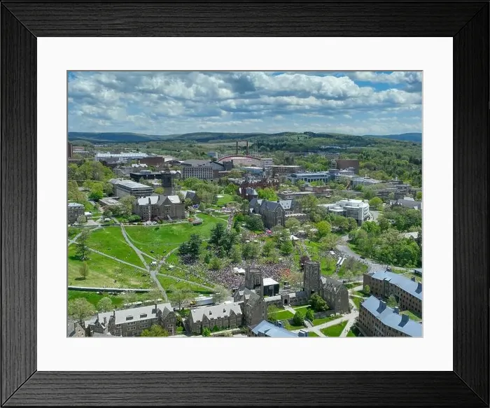 Framed Print : Ithaca, NY, USA - 05-08-2024: Distant aerial images of Slope Day at Cornell University Libe Slope, Ithaca, NY, USA