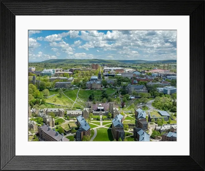 Framed Print : Ithaca, NY, USA - 05-08-2024: Distant aerial images of Slope Day at Cornell University Libe Slope, Ithaca, NY, USA Framed Print : Ithaca, NY, USA - 05-08-2024: Distant aerial images of Slope Day at Cornell University Libe Slope, Ithaca, NY, USA