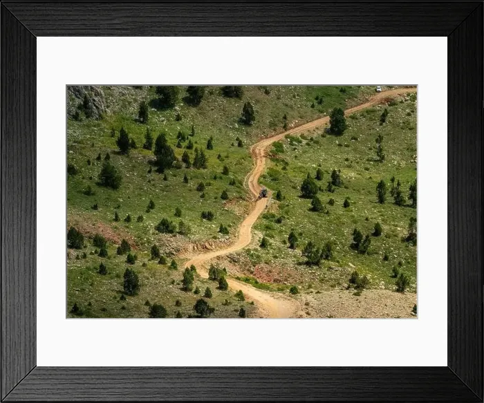 Framed Print : A dirt road passing through the highlands. Footpath road work in the mountains in Turkey Framed Print : A dirt road passing through the highlands. Footpath road work in the mountains in Turkey