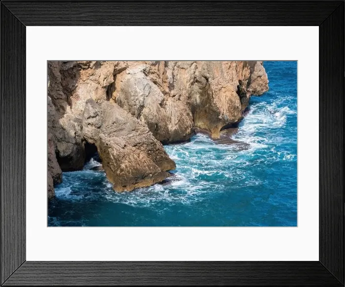 Framed Print : Waves of a deep blue sea crashing against the rocks in Antalya Turkey Framed Print : Waves of a deep blue sea crashing against the rocks in Antalya Turkey